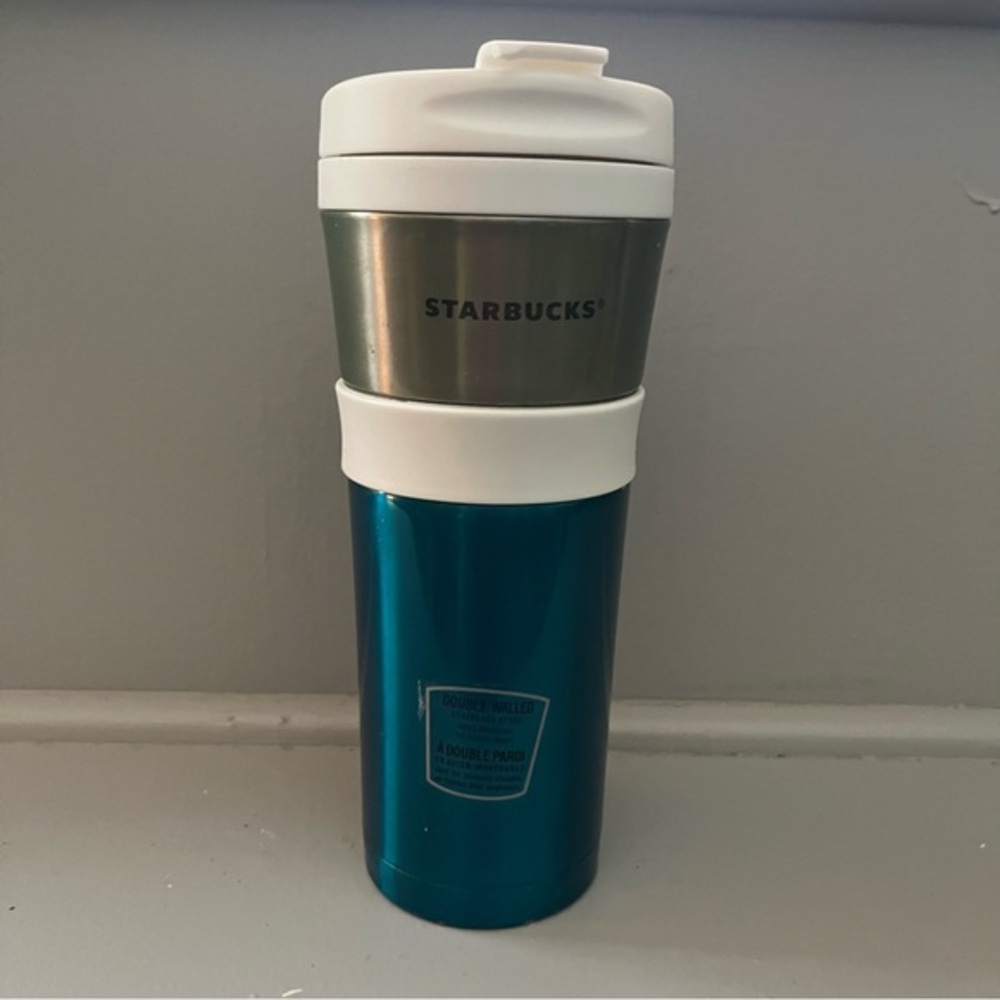 STARBUCKS 2011 TEAL and
SILVER STAINLESS STEEL TRAVEL TUMBLER
